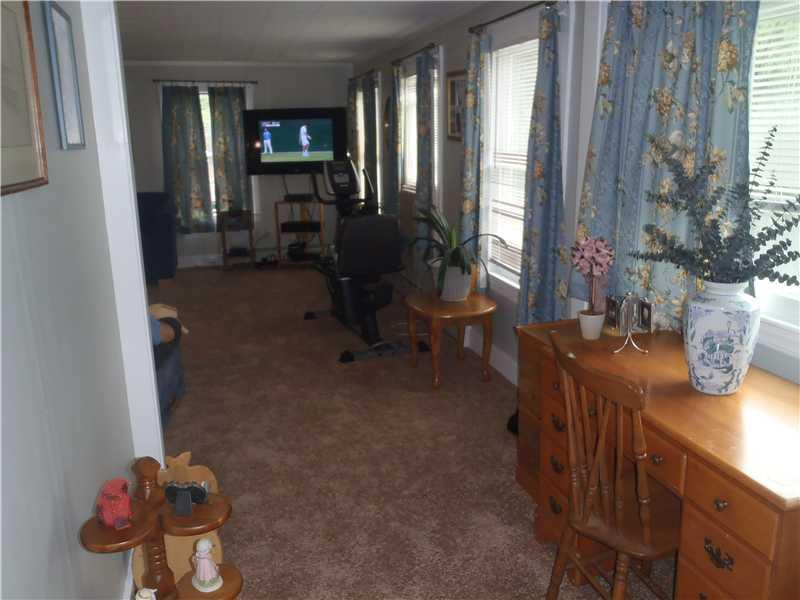 21 Sebasco Road Phippsburg, ME 04562 - Photo 12 of 21 Living Room. Southern wall of...