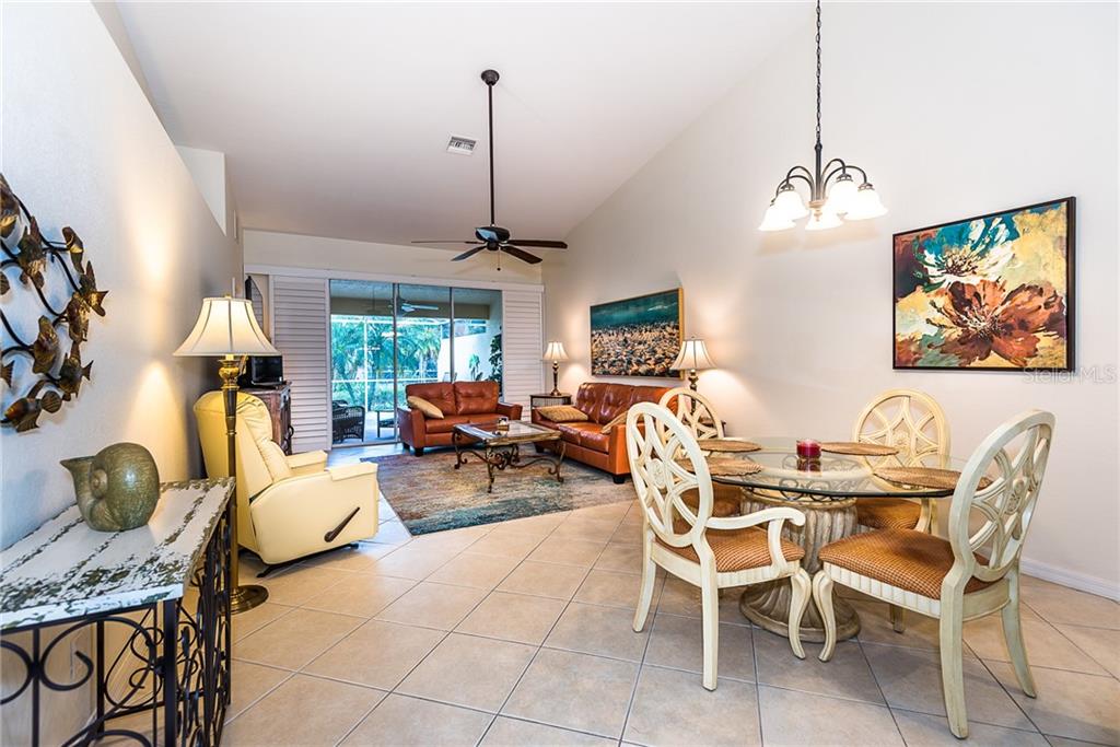 3800 Tripoli Boulevard, Unit 35 Punta Gorda, FL 33950 - Photo 17 of 44 a view of a livingroom with furniture and window