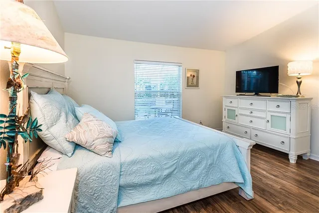 a spacious bathroom with a shower and a sink