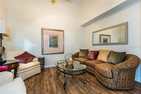 a living room with furniture and a table