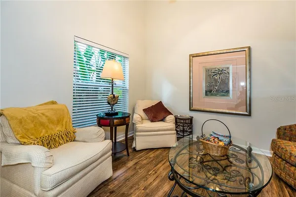 a living room with furniture and window