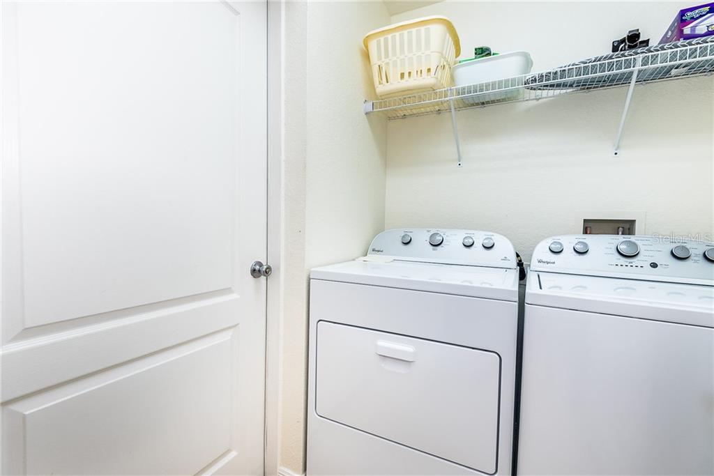 3800 Tripoli Boulevard, Unit 35 Punta Gorda, FL 33950 - Photo 43 of 44 a utility room with dryer and washer