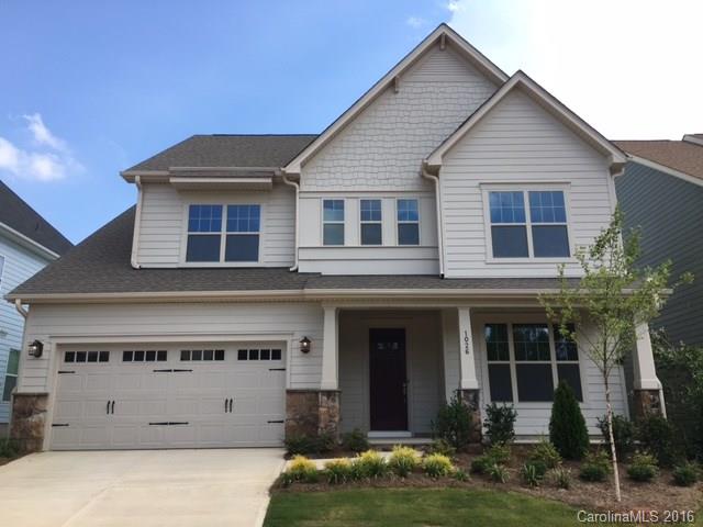 1026 Emory Lane, Unit 74 Fort Mill, SC 29708 - Photo 1 of 23 a front view of a house with garden