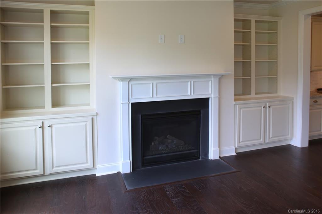 1026 Emory Lane, Unit 74 Fort Mill, SC 29708 - Photo 7 of 23 a living room with a fireplace