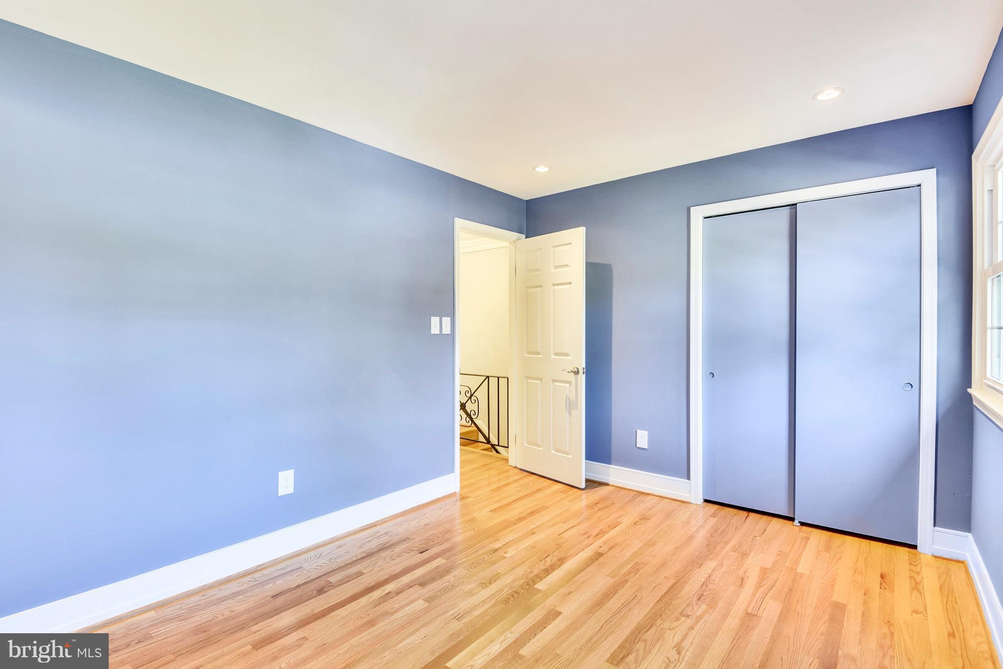 4017 Olney Laytonsville Road Olney, MD 20832 - Photo 13 of 28 a view of an empty room with wooden floor