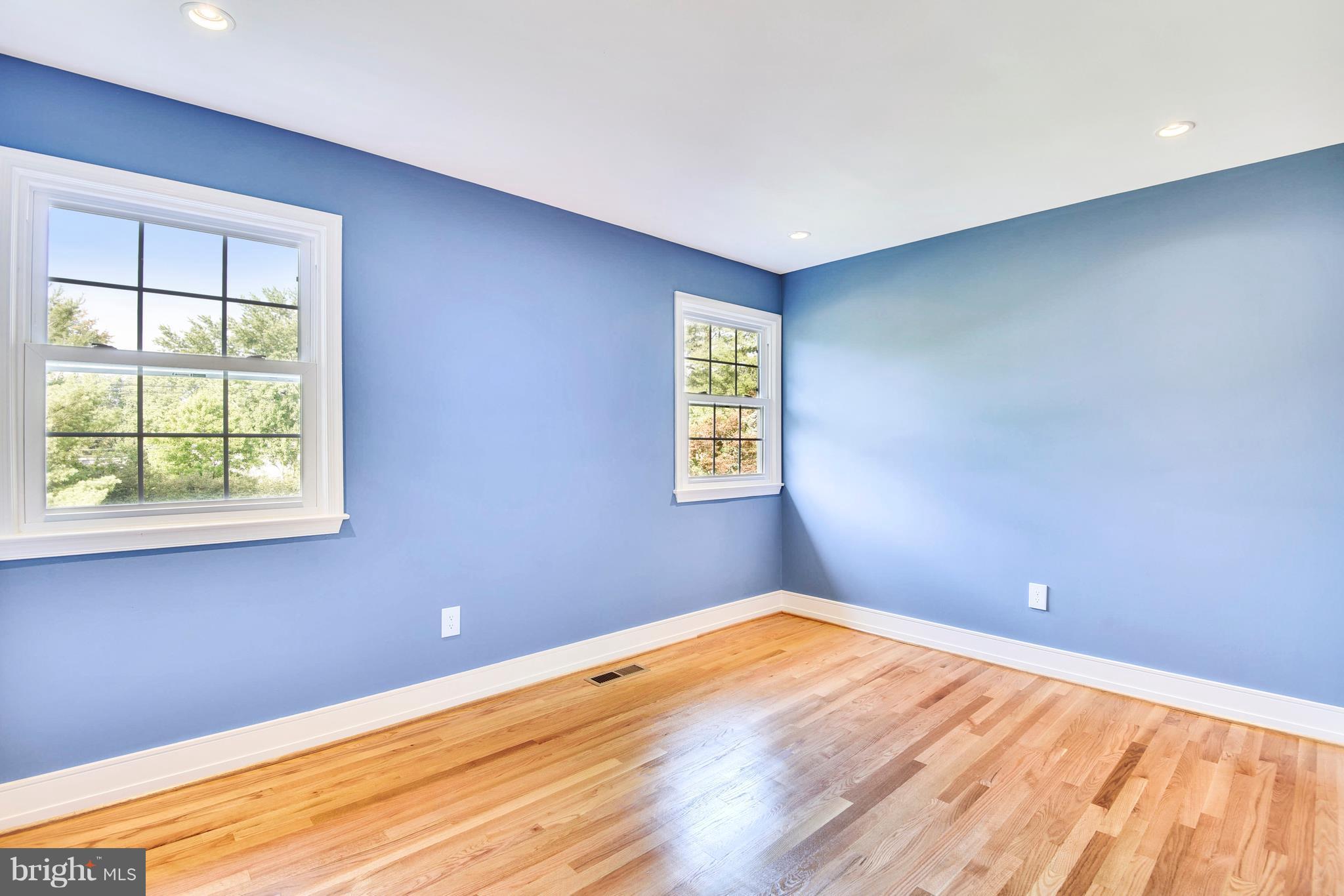 4017 Olney Laytonsville Road Olney, MD 20832 - Photo 14 of 28 a view of empty room with wooden floor and fan