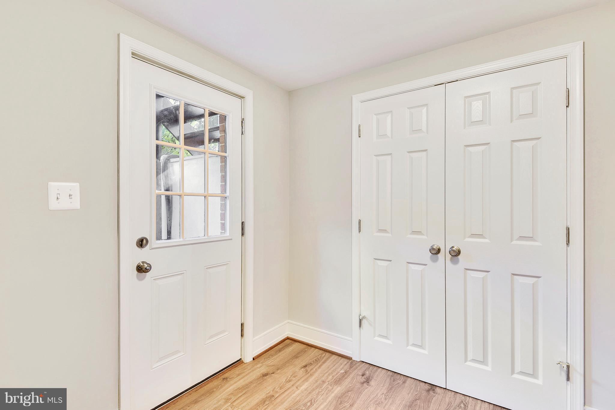 4017 Olney Laytonsville Road Olney, MD 20832 - Photo 18 of 28 an empty room with wooden floor