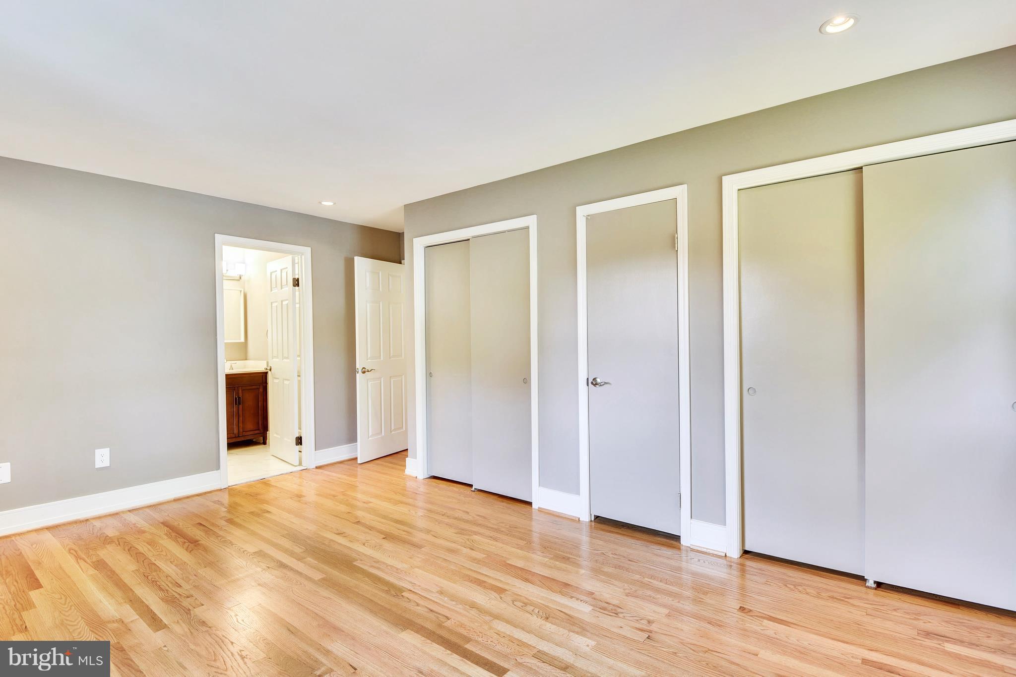 4017 Olney Laytonsville Road Olney, MD 20832 - Photo 27 of 28 a view of empty room with wooden floor