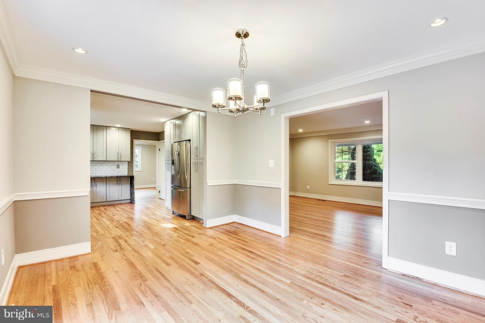 4017 Olney Laytonsville Road Olney, MD 20832 - Photo 4 of 28 a view of a room with wooden floor and staircase