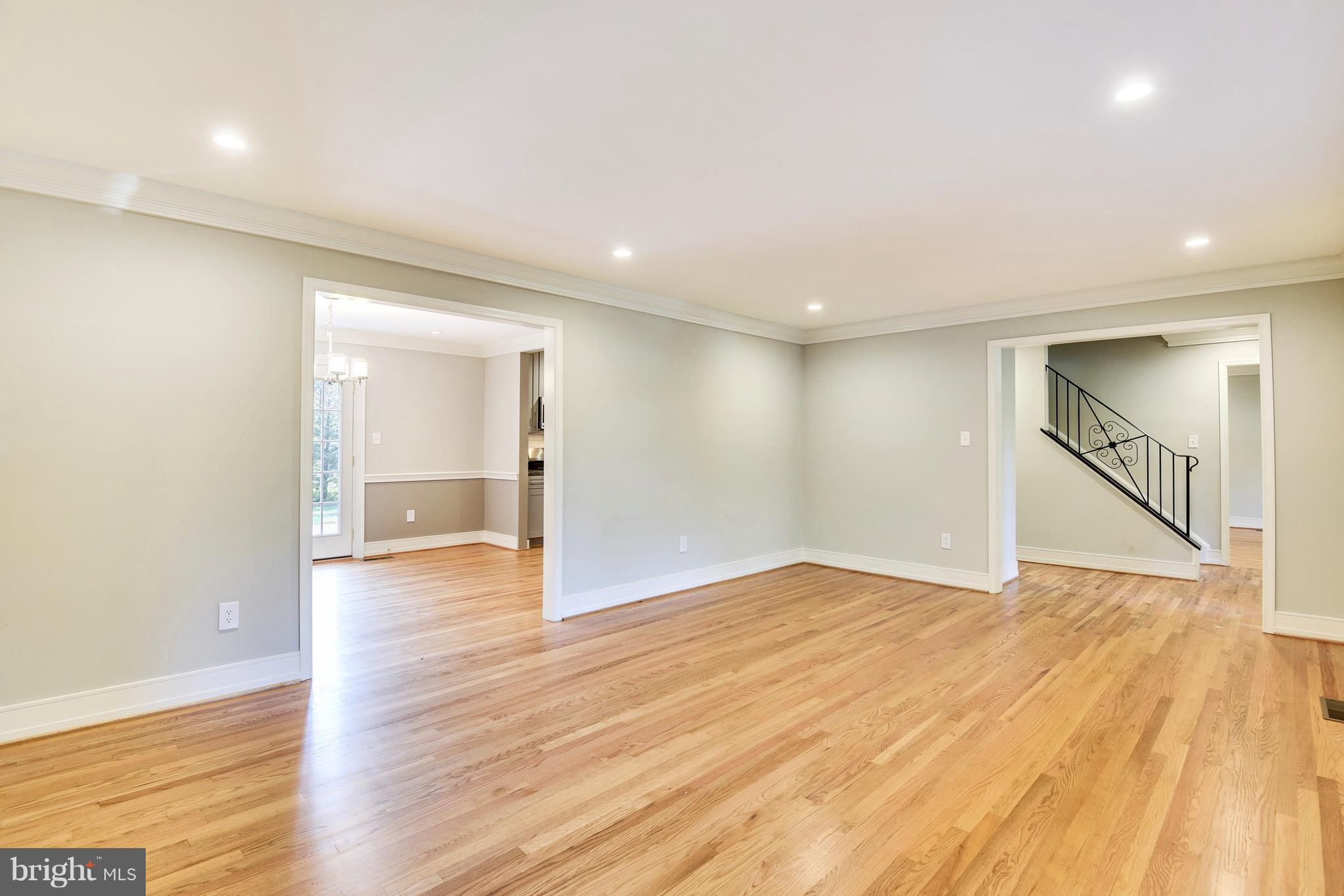 4017 Olney Laytonsville Road Olney, MD 20832 - Photo 10 of 28 a view of an empty room with wooden floor and a window