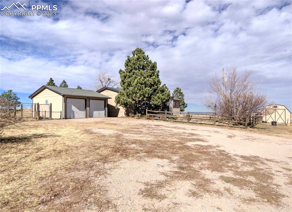 28850 Funk Road Calhan, CO 80808 - Photo 2 of 42 a view of house with yard and entertaining space