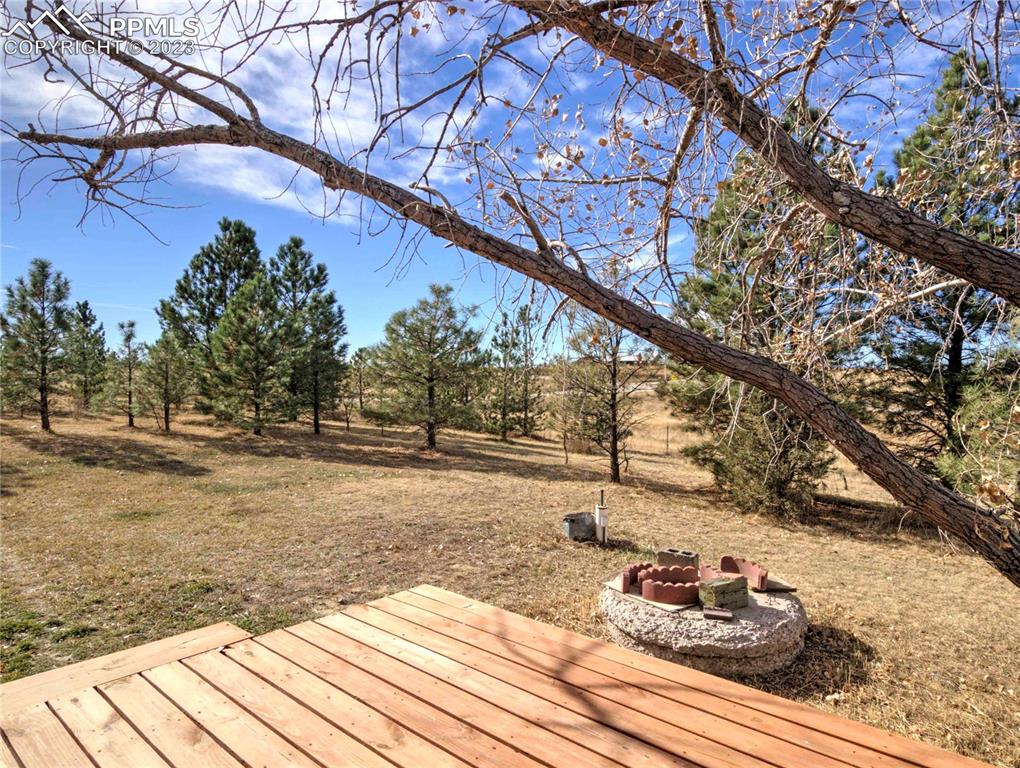 28850 Funk Road Calhan, CO 80808 - Photo 22 of 42 a view of a backyard of the house