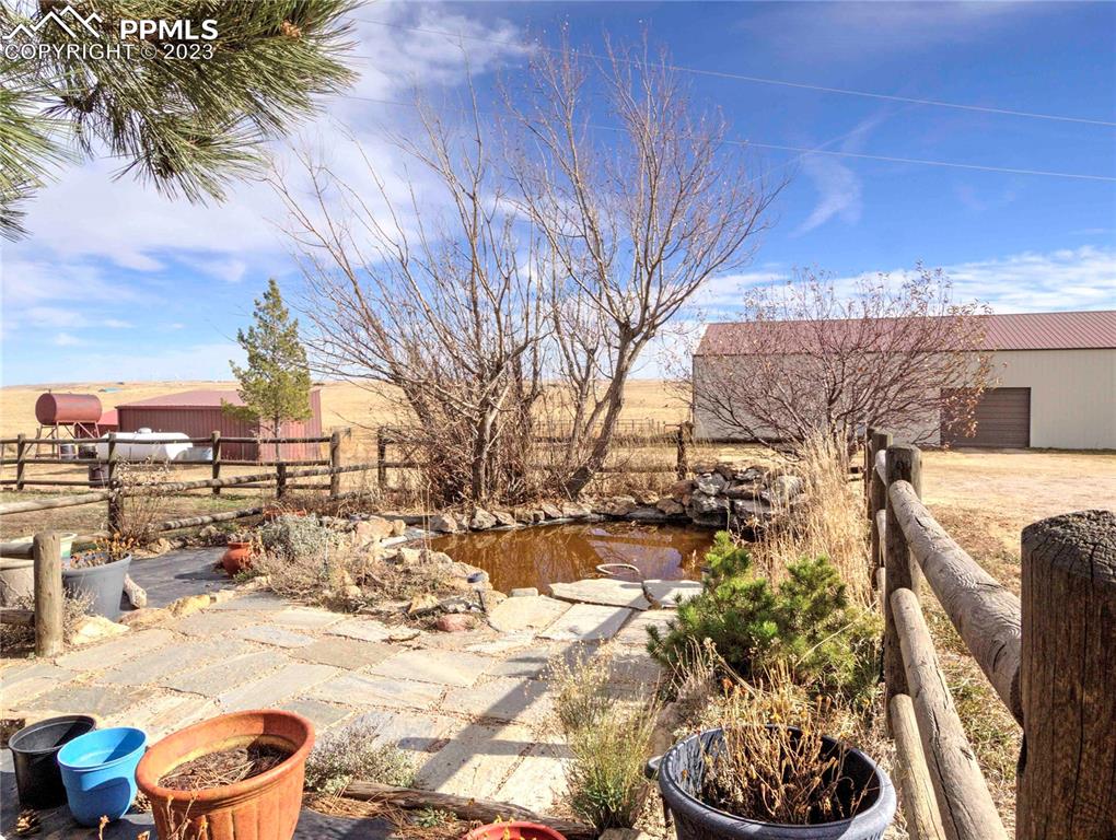 28850 Funk Road Calhan, CO 80808 - Photo 3 of 42 a view of a backyard of the house