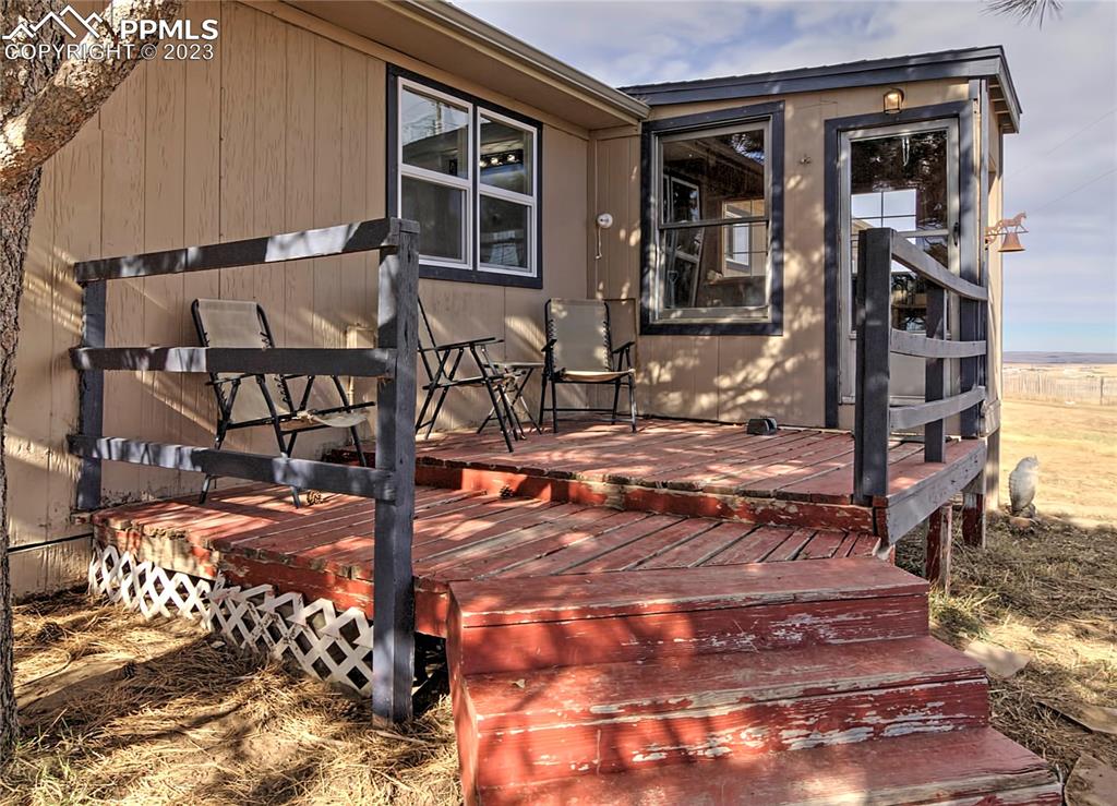 28850 Funk Road Calhan, CO 80808 - Photo 4 of 42 a outdoor view of a house with sitting area