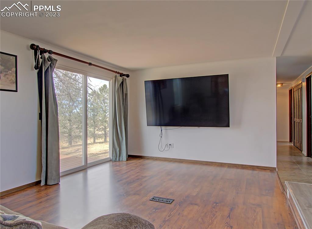 28850 Funk Road Calhan, CO 80808 - Photo 8 of 42 a view of a livingroom with a flat screen tv