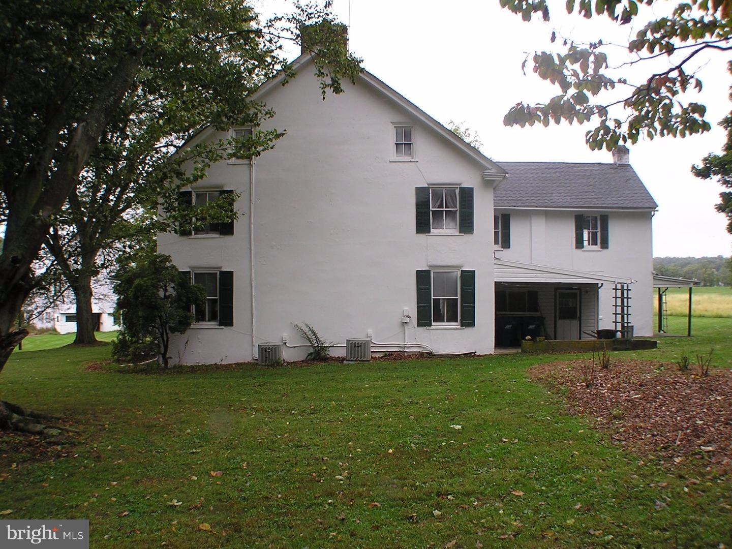 120 Scarlet Road Kennett Square, PA 19348 - Photo 2 of 25 a front view of a house with garden