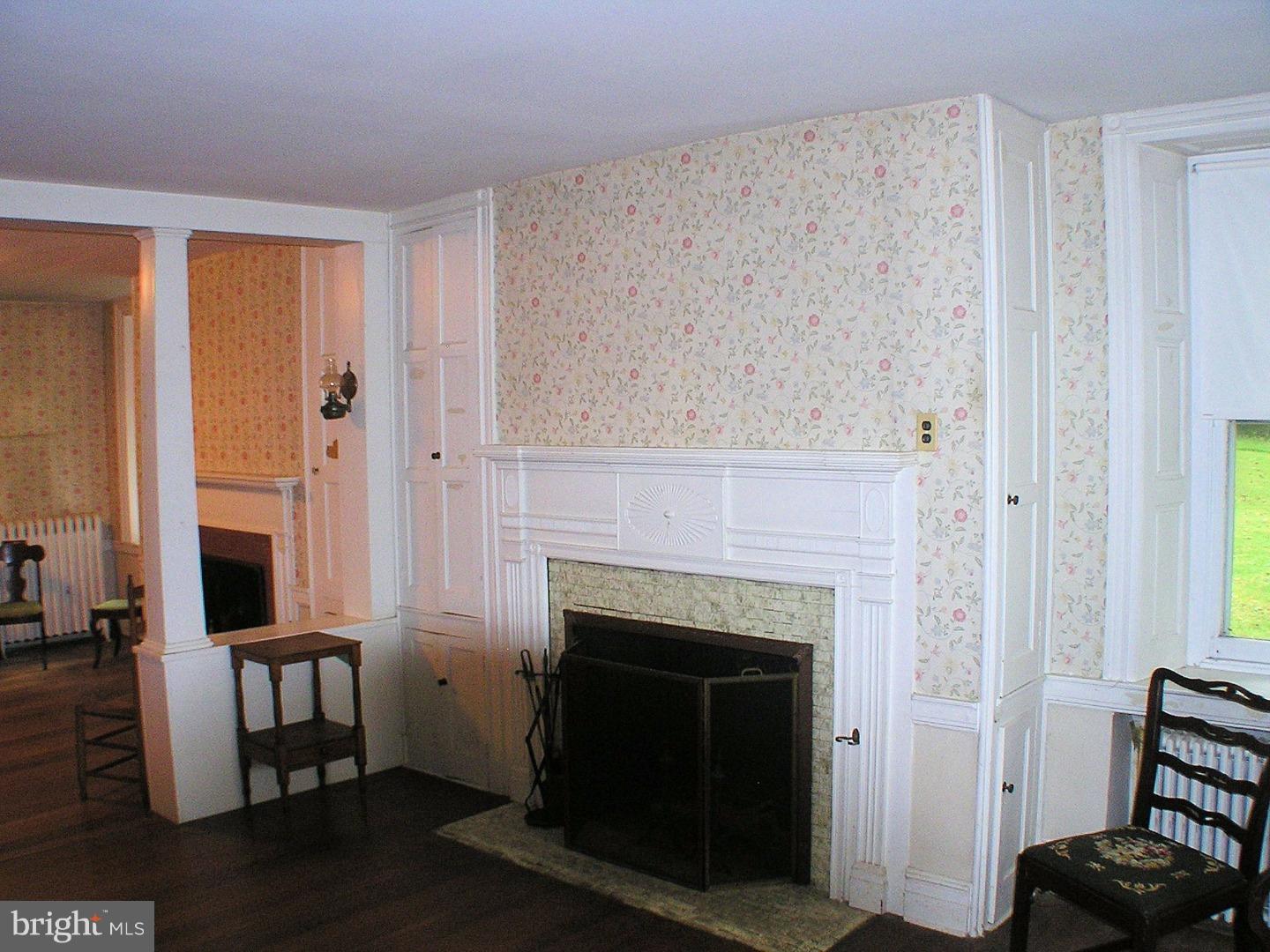 120 Scarlet Road Kennett Square, PA 19348 - Photo 11 of 25 a living room with furniture and a fireplace