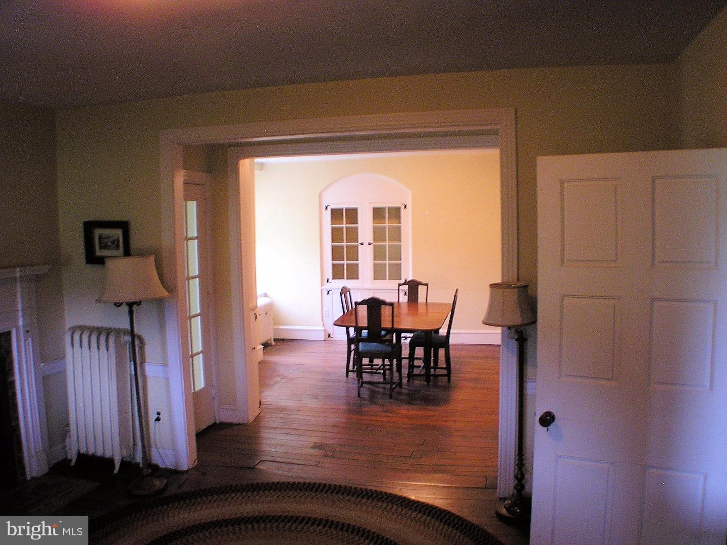 120 Scarlet Road Kennett Square, PA 19348 - Photo 7 of 25 a view of a dining room with furniture window and wooden floor