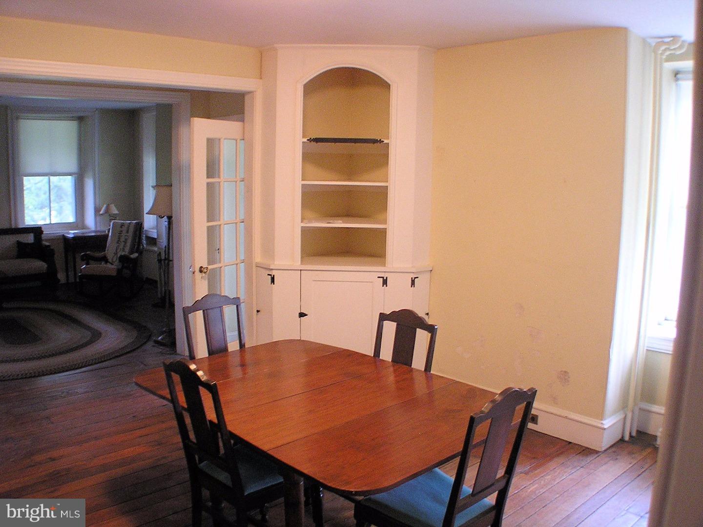 120 Scarlet Road Kennett Square, PA 19348 - Photo 8 of 25 a view of a dining room with furniture and wooden floor