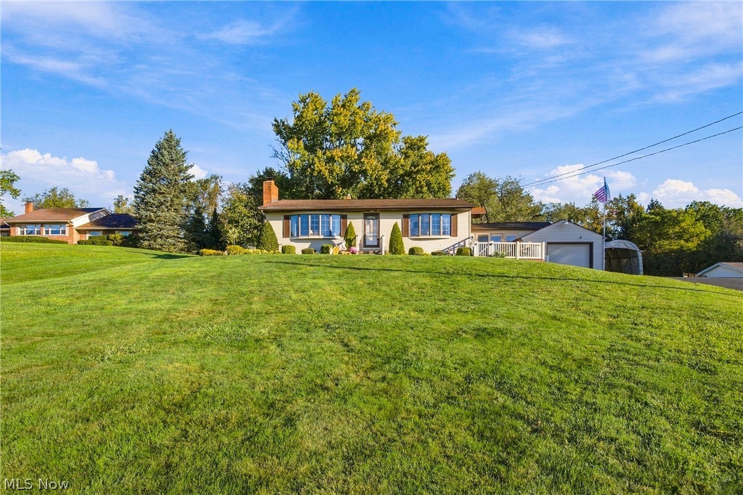 1211 Etter Road Mogadore, OH 44260 - Photo 3 of 48 Expansive green lawn and mature trees