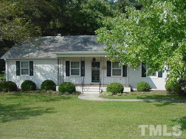 3909 Buffaloe Road Raleigh, NC 27604 - Photo 1 of 11 a view of a house with backyard