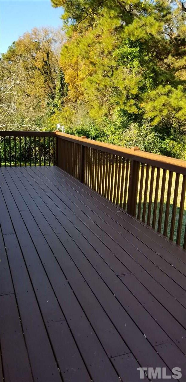 3909 Buffaloe Road Raleigh, NC 27604 - Photo 8 of 11 a view of balcony with wooden floor
