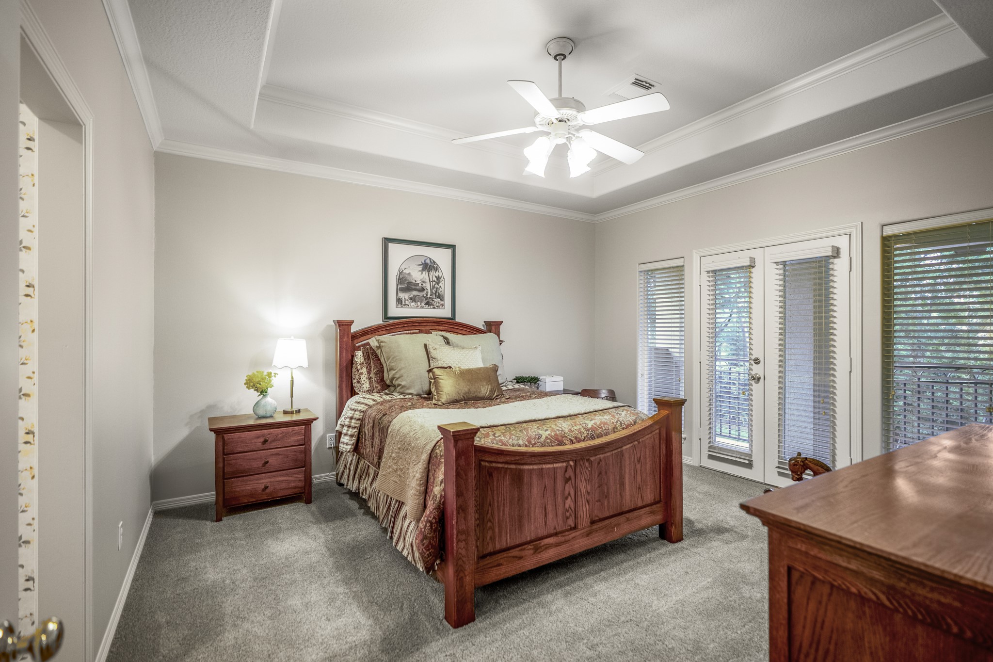 8806 Sterling Gate Circle Spring, TX 77379 - Photo 29 of 40 This is one of three bedrooms on the second floor. This bedroom has French doors that lead out to a balcony on the back of the home.