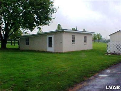3124 Newburg Road Nazareth, PA 18064 - Photo 5 of 5 a white house with green field in front of it