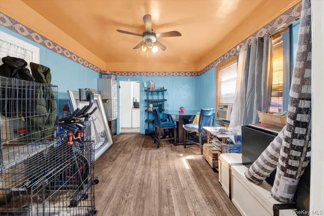 a view of a livingroom with furniture gym equipment