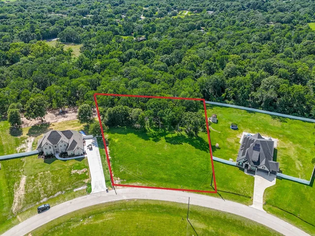 a view of a backyard with wooden floor