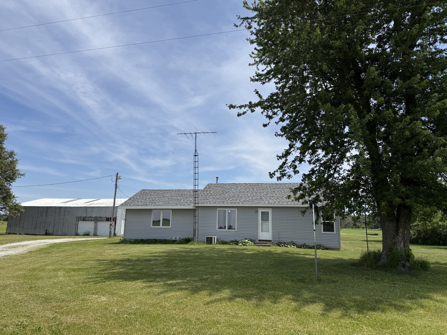3266 North 2700 East Road Beaverville, IL 60912 - Photo 1 of 1 a house view with a garden space