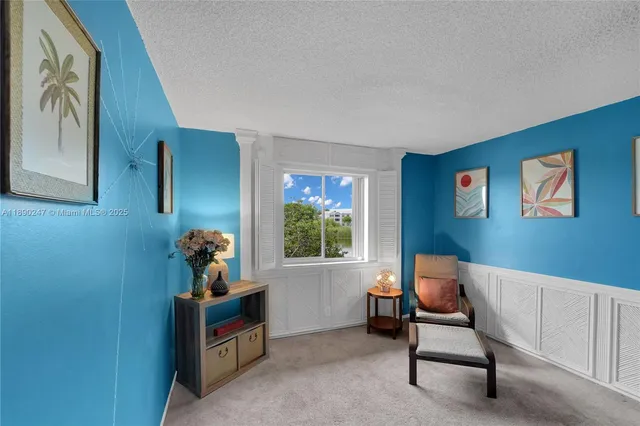 a room with furniture and window