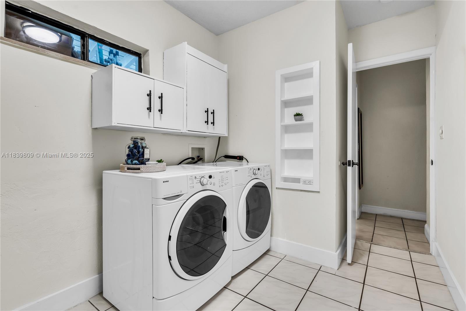 2121 Southwest 13th Avenue Miami, FL 33145 - Photo 14 of 43 a view of kitchen with washer and dryer