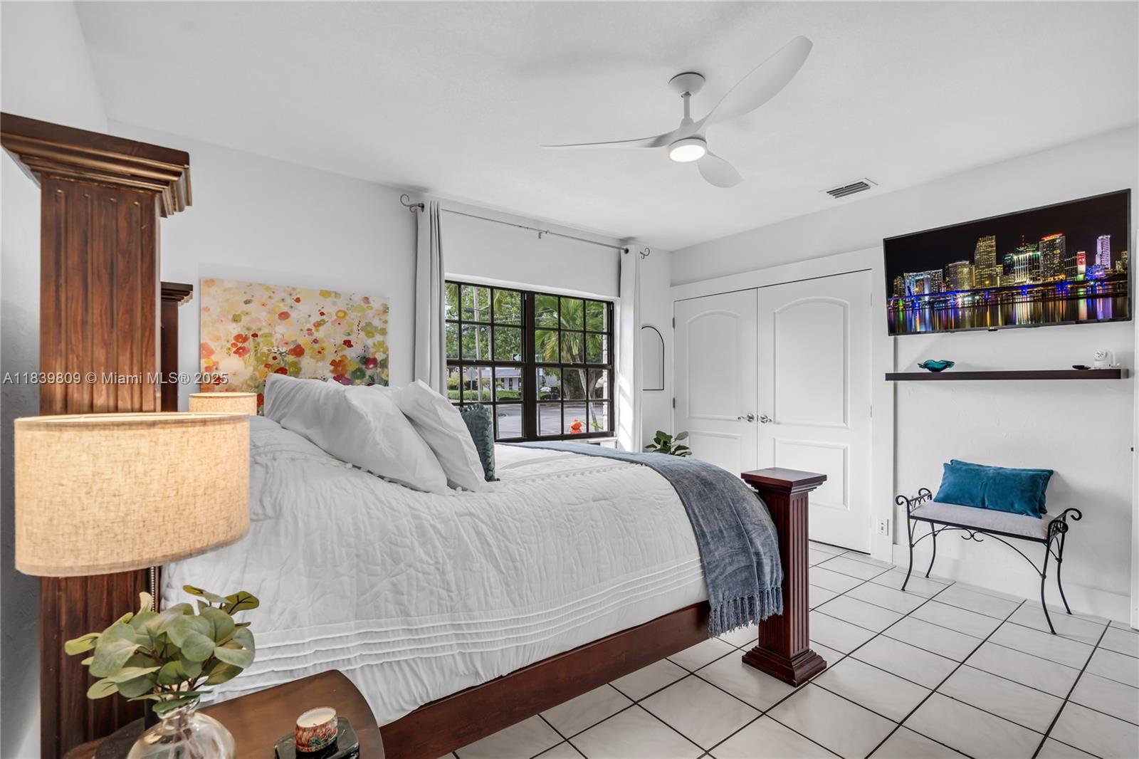 2121 Southwest 13th Avenue Miami, FL 33145 - Photo 20 of 43 a bedroom with a bed and window