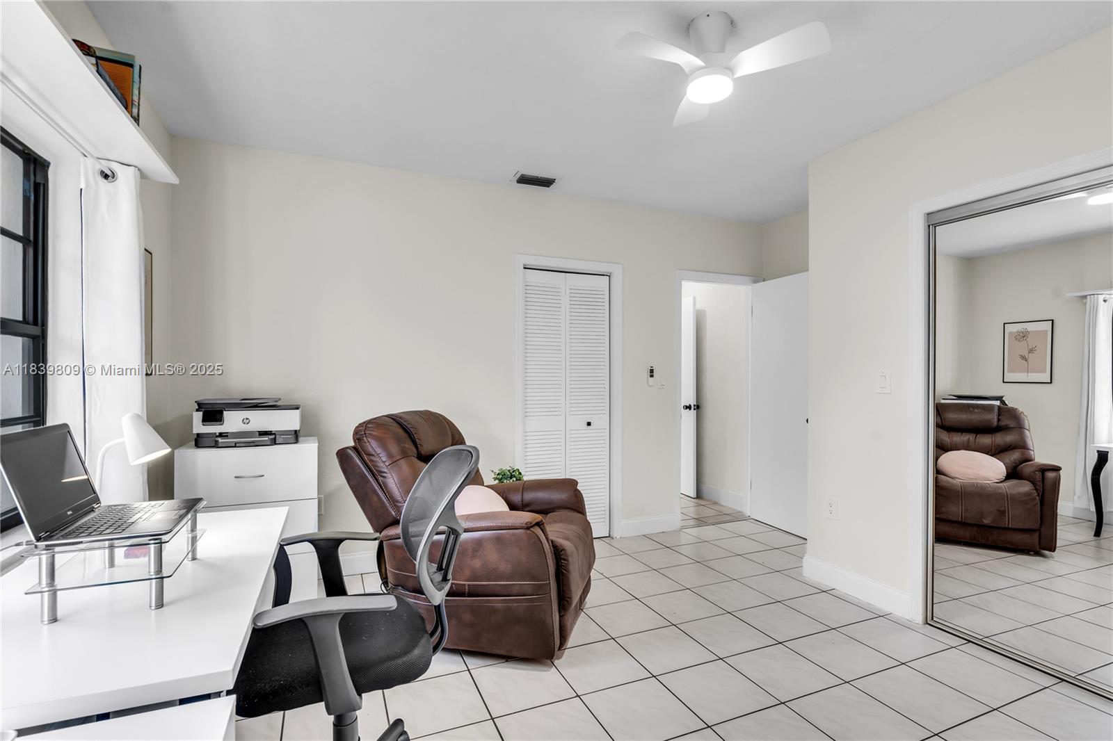 2121 Southwest 13th Avenue Miami, FL 33145 - Photo 24 of 43 a view of a room with furniture and windows