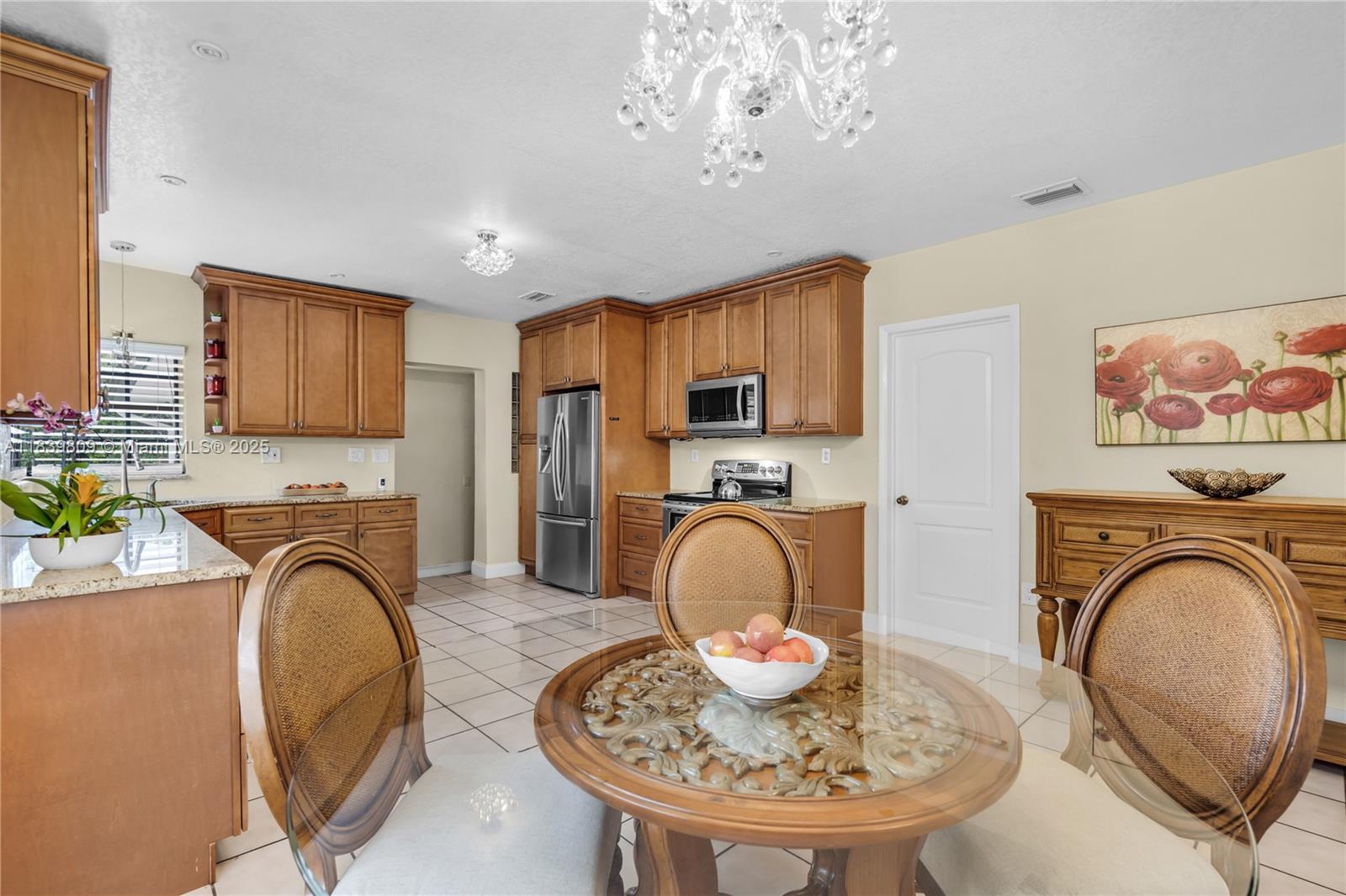 2121 Southwest 13th Avenue Miami, FL 33145 - Photo 9 of 43 a living room with furniture a sink and a fireplace