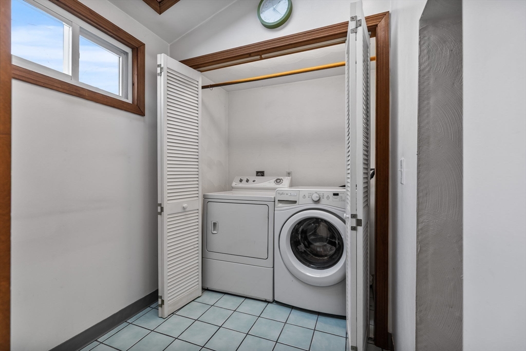 12 Wright Street, Unit 1 Stoneham, MA 02180 - Photo 14 of 36 a utility room with dryer and washer