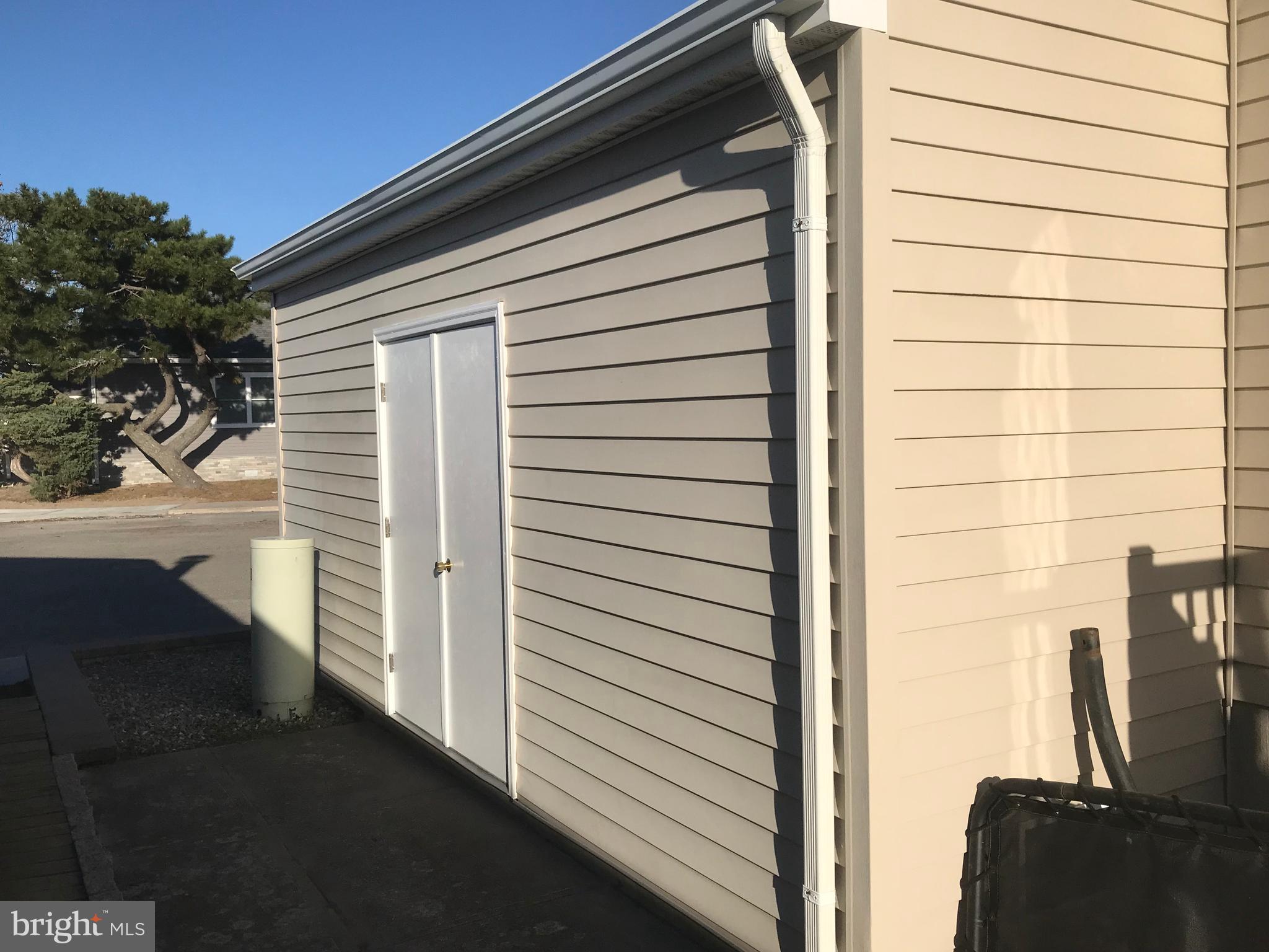 138 Pine Tree Road Ocean City, MD 21842 - Photo 31 of 55 Large Storage Shed on outside