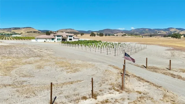 a view of an ocean and a mountain