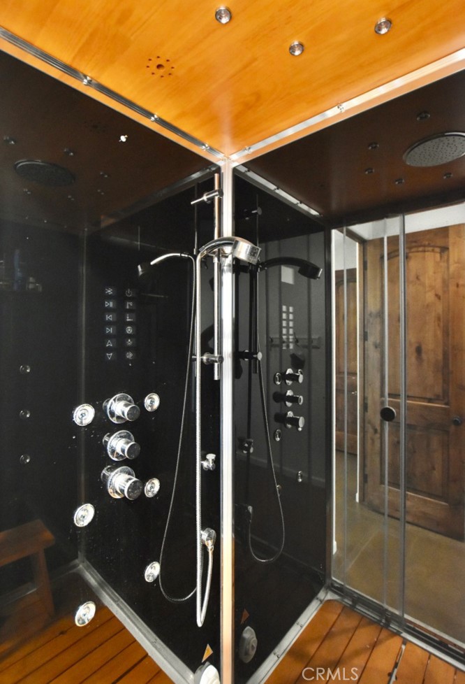 50645 Lockwood Road Lockwood, CA 93426 - Photo 34 of 48 a bathroom with a glass shower door