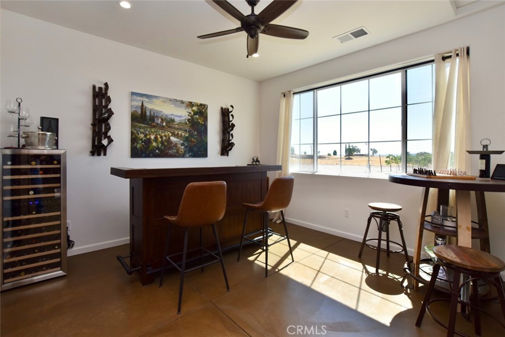 50645 Lockwood Road Lockwood, CA 93426 - Photo 36 of 48 a view of a workspace with furniture and a window