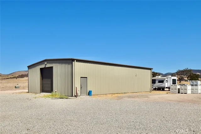 a view of parking garage with cars