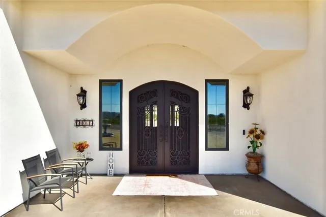 a view of an entryway with a workspace