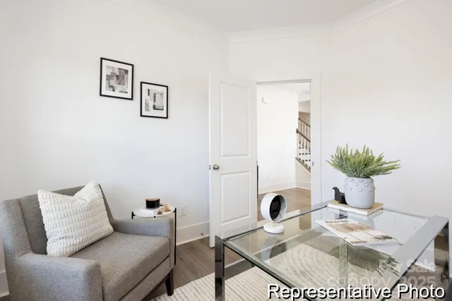 a living room with furniture and a table