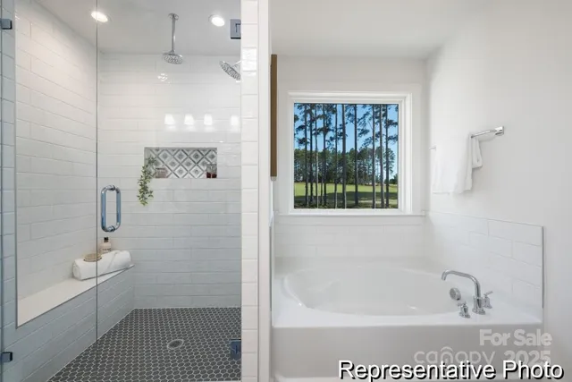 a bathroom with a shower a toilet and a shower