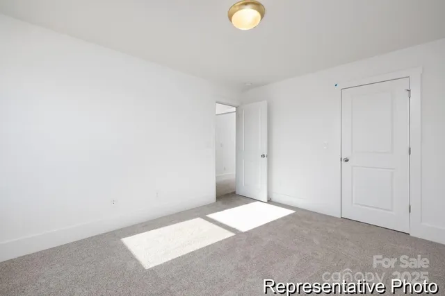 a view of a livingroom with wooden floor