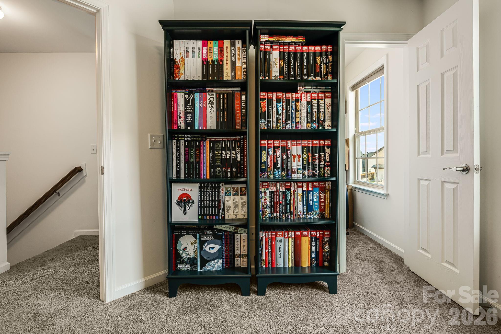 486 Cardwell Lane Fletcher, NC 28732 - Photo 20 of 35 a view of room with book shelf