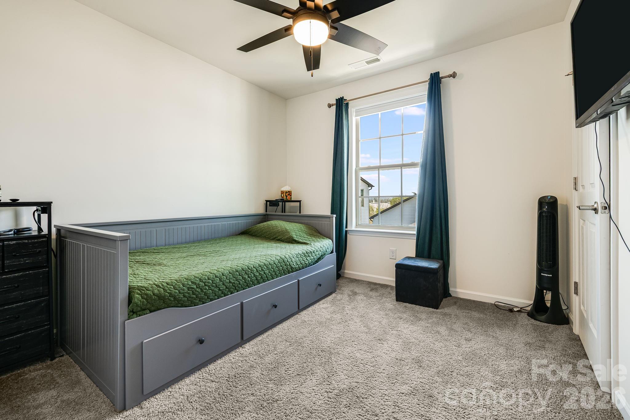 486 Cardwell Lane Fletcher, NC 28732 - Photo 22 of 35 a bedroom with windows