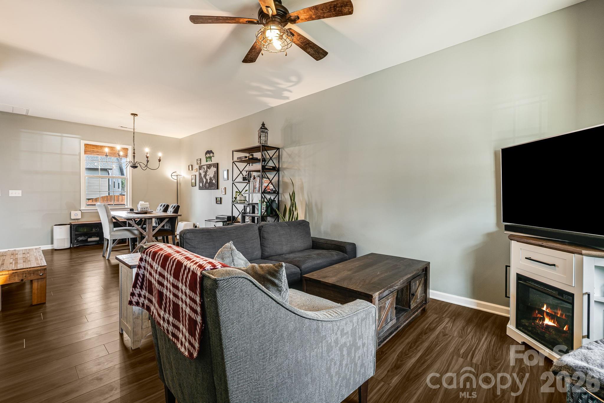 486 Cardwell Lane Fletcher, NC 28732 - Photo 5 of 35 a living room with furniture and a flat screen tv