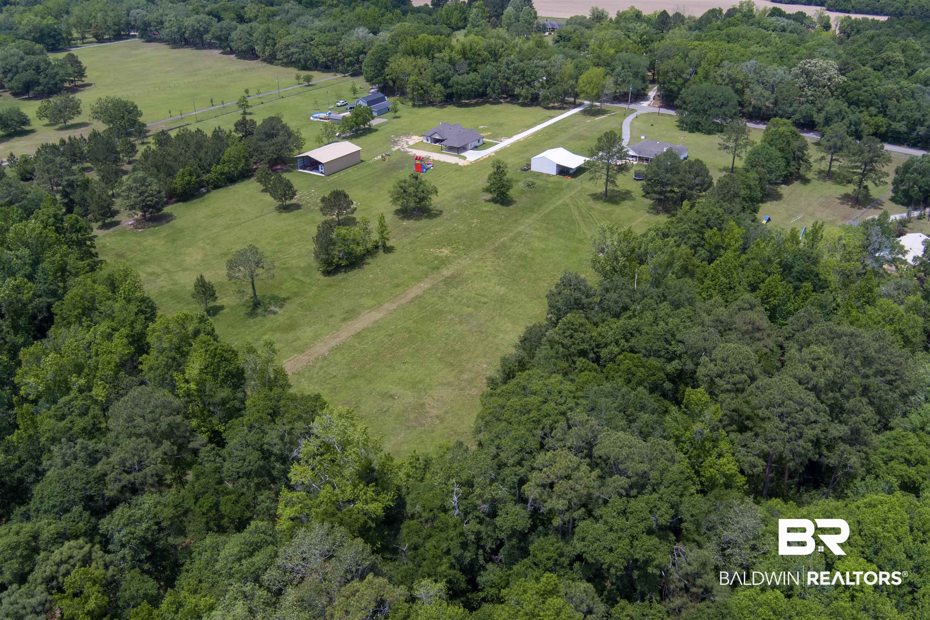 13925 Fort Lake Road Grand Bay, AL 36541 - Photo 32 of 37 Aerial view with a rural view and a wooded view